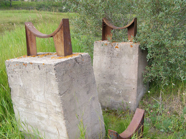 perhaps a stand to hold oil drums